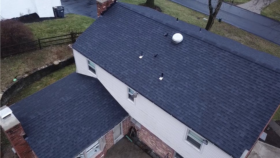 Completed roof replacement in Pittsburgh PA with GAF architectural shingles rear aerial view
