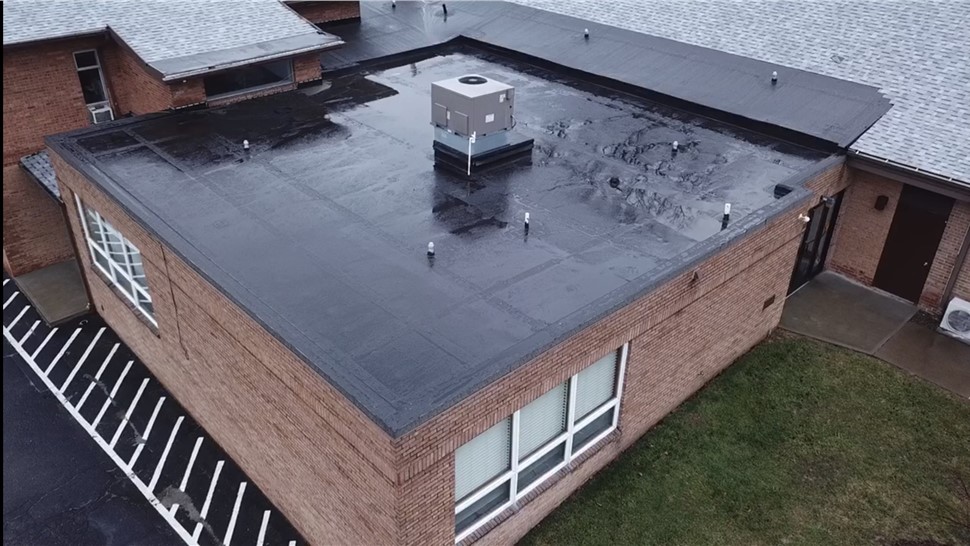 Commercial flat roof coating in Pittsburgh PA with Mule-Hide system applied