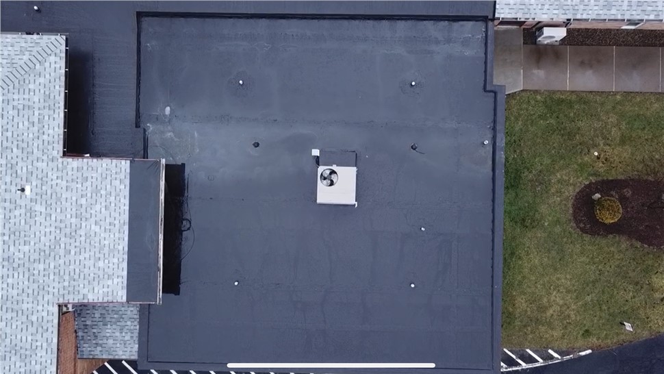 Top view of commercial flat roof coating in Pittsburgh PA