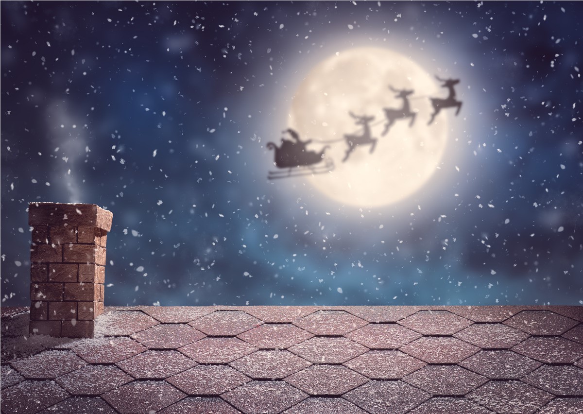 Santa's sleigh heading to the next house. 