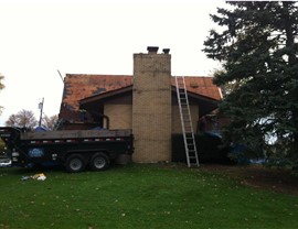 The roof of a home was damaged in a storm