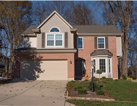 A two story home with new windows
