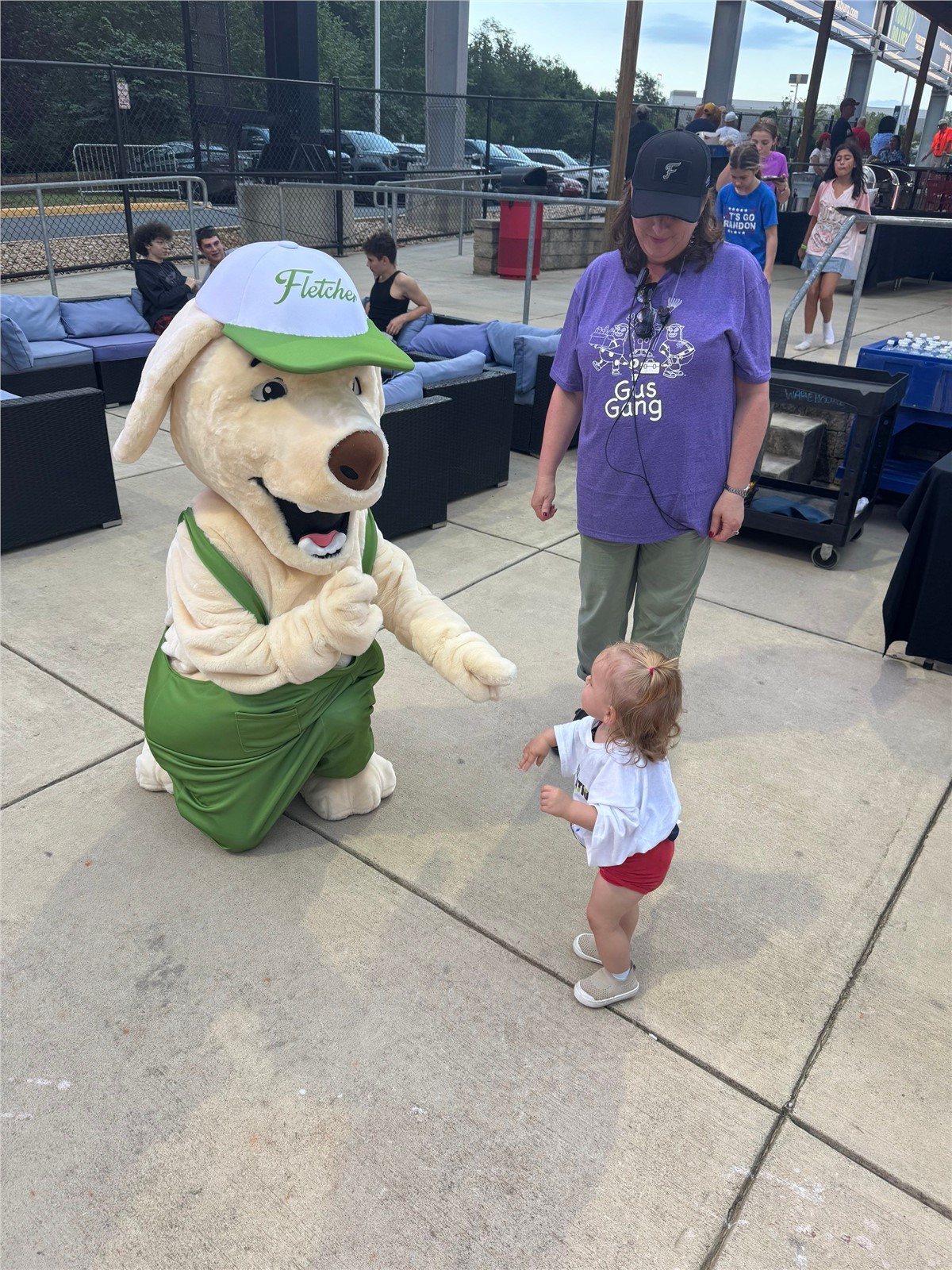 Roofus interacting with kid at Fred Nats