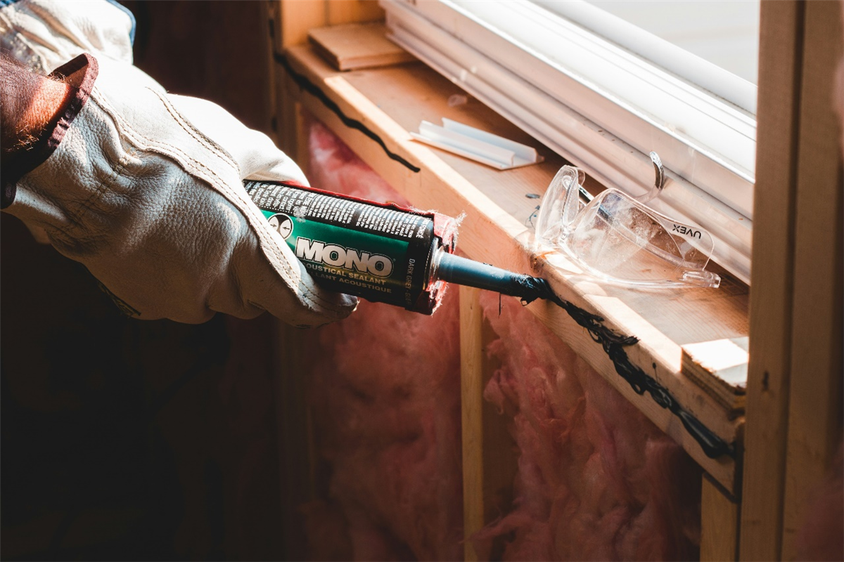 worker using a sealant