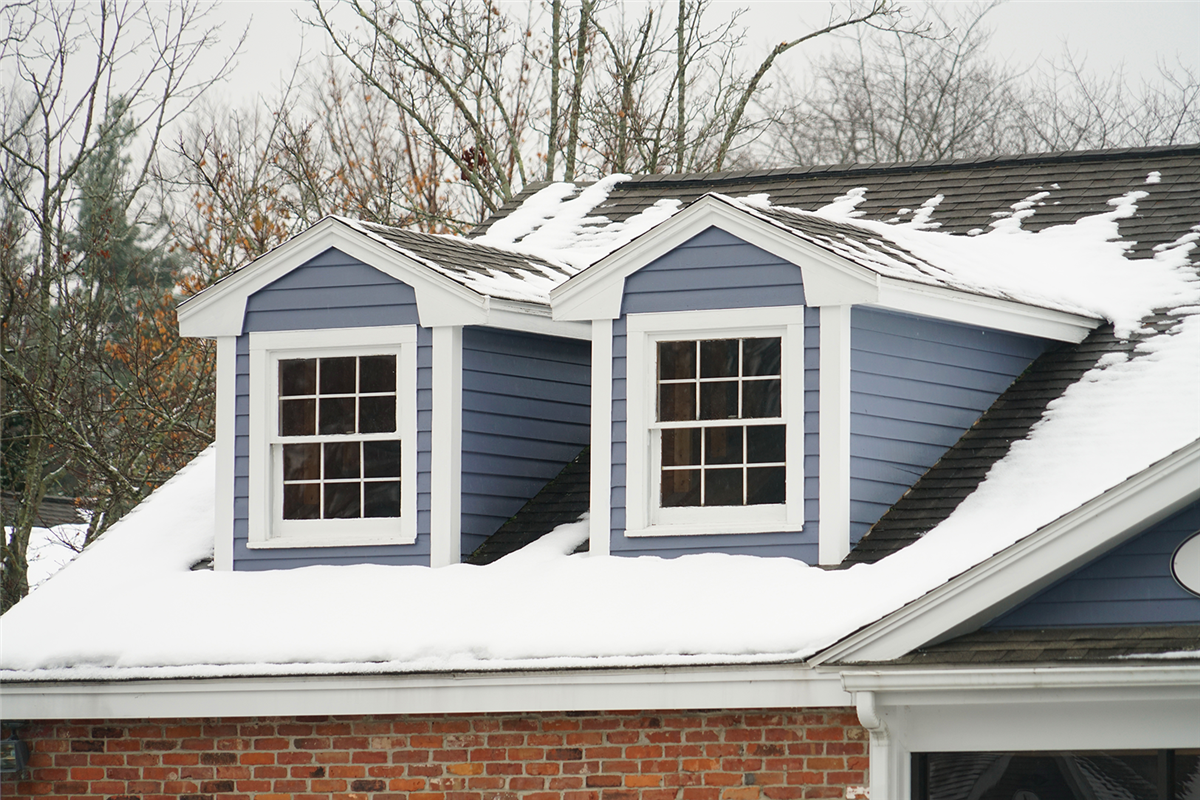 How to protect your asphalt shingle roof from winter damage.