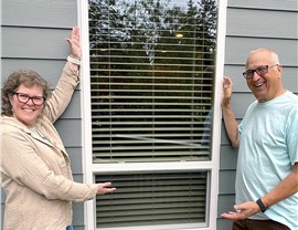 Happy Harley Exteriors customers showcasing their latest window home upgrade.