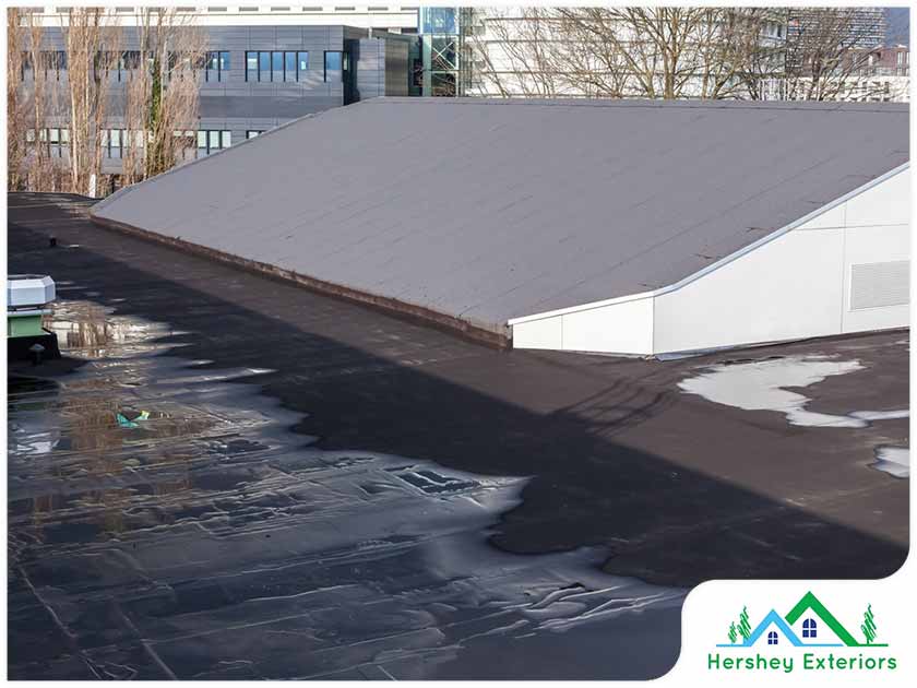 How Does Moisture Damage a Roof?