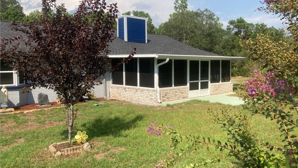 Sunrooms & Enclosures Project in Navarre, FL by Hometown Contractors, Inc.