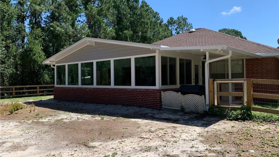 Sunrooms & Enclosures Project in Navarre, FL by Hometown Contractors, Inc.