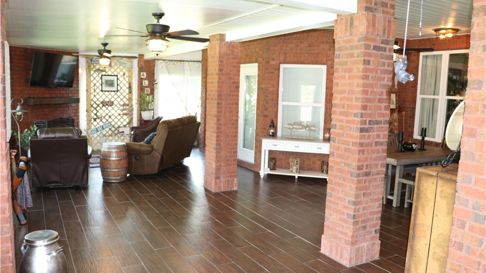 Sunrooms & Enclosures Project in Navarre, FL by Hometown Contractors, Inc.