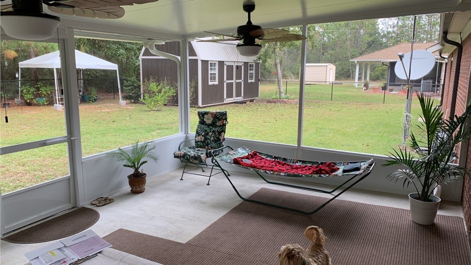 Sunrooms & Enclosures Project in Milton, FL by Hometown Contractors, Inc.