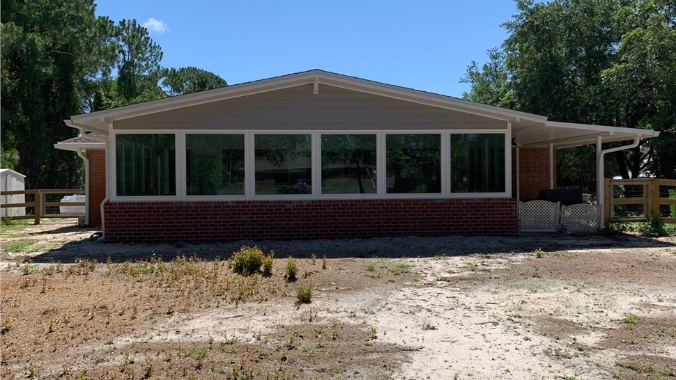Sunrooms & Enclosures Project in Navarre, FL by Hometown Contractors, Inc.