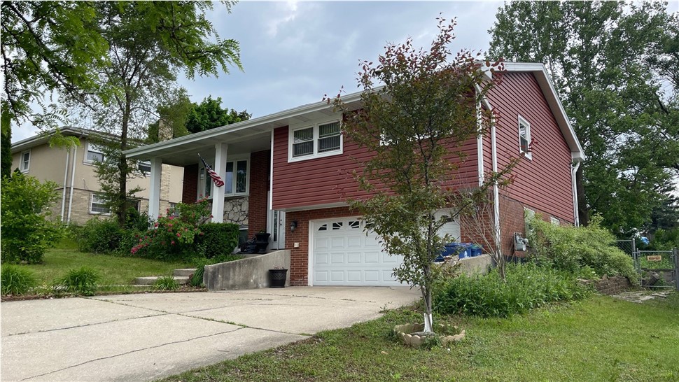 Gutters, Siding Project in Hickory Hills, IL by Horizon Restoration