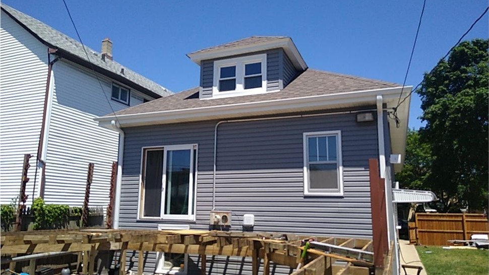 Gutters, Siding Project in Chicago, IL by Horizon Restoration