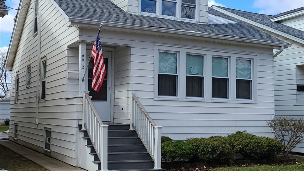 Gutters, Siding Project in Chicago, IL by Horizon Restoration