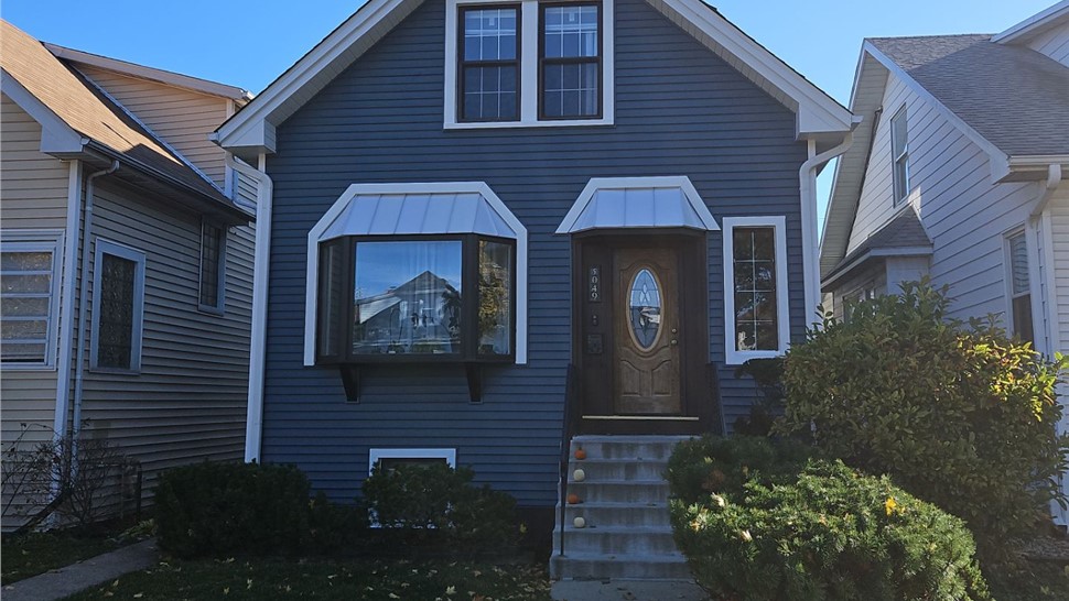 Awnings, Doors, Gutters, Roofing, Siding Project in Chicago, IL by Horizon Restoration