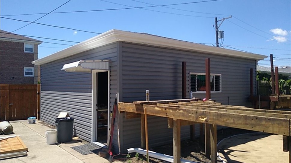 Gutters, Siding Project in Chicago, IL by Horizon Restoration