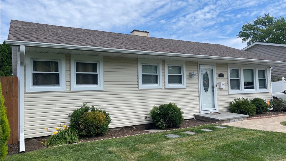 Gutters, Siding Project in Waukegan, IL by Horizon Restoration