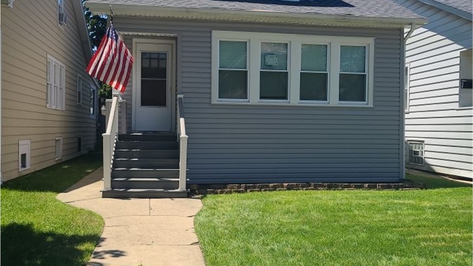 Gutters, Siding Project in Chicago, IL by Horizon Restoration