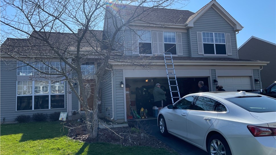 Awnings, Doors, Gutters, Roofing, Siding Project in Oswego, IL by Horizon Restoration