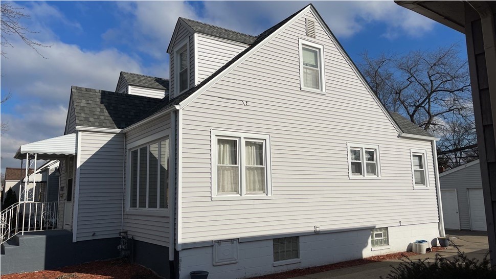 Awnings, Gutters, Roofing, Siding Project in Lansing, IL by Horizon Restoration