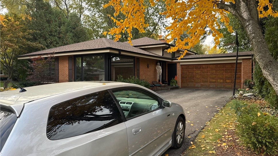 Gutters, Roofing, Roofing Replacement Project in Arlington Heights, IL by Horizon Restoration