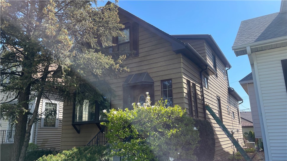 Awnings, Doors, Gutters, Roofing, Siding Project in Chicago, IL by Horizon Restoration