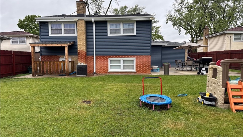 Gutters, Roofing, Roofing Replacement, Siding Project in Des Plaines, IL by Horizon Restoration