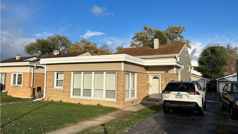 Gutters, Siding Project in Dolton, IL by Horizon Restoration