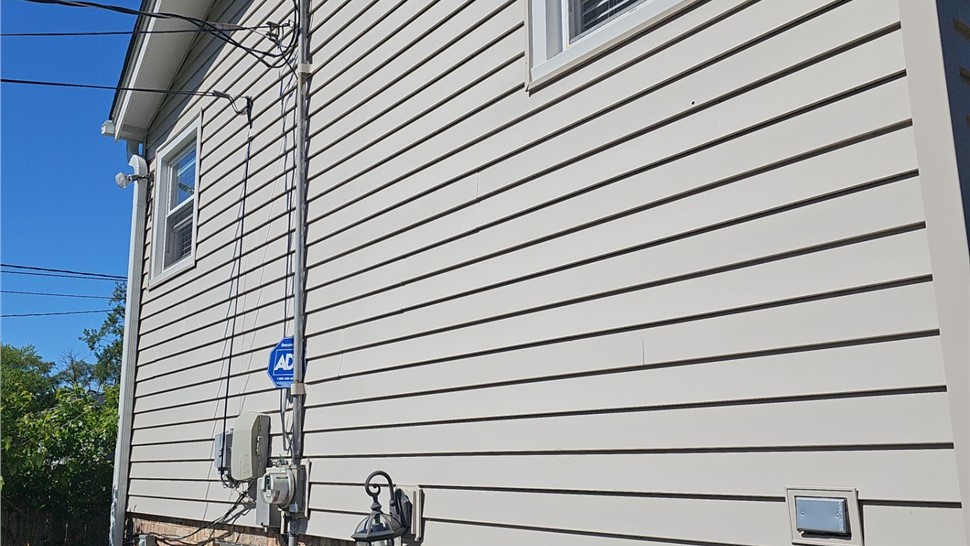 Gutters, Roofing, Siding Project in Evanston, IL by Horizon Restoration