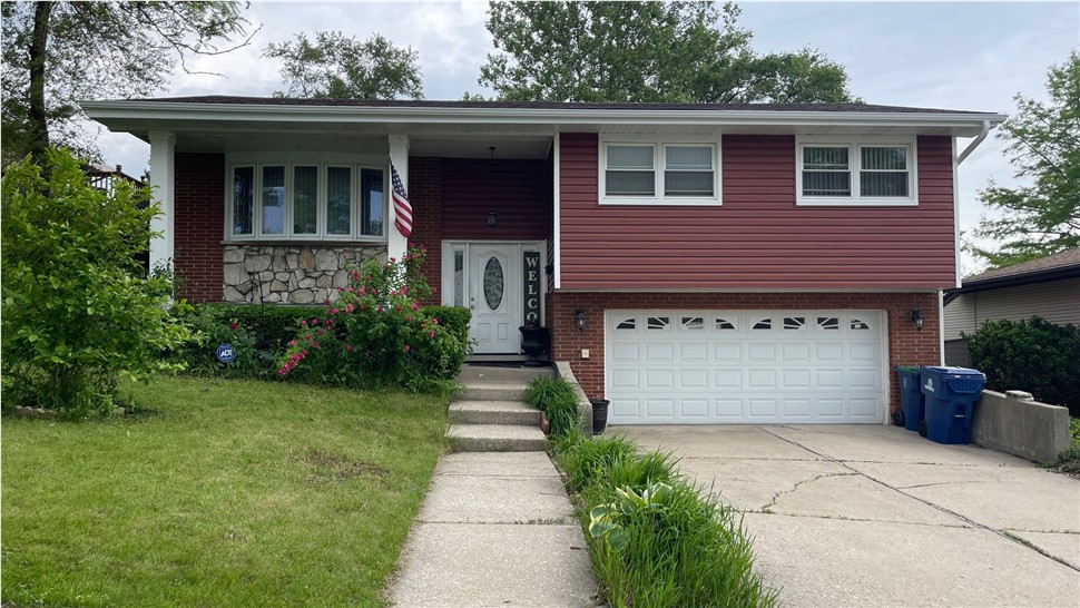 Gutters, Siding Project in Hickory Hills, IL by Horizon Restoration