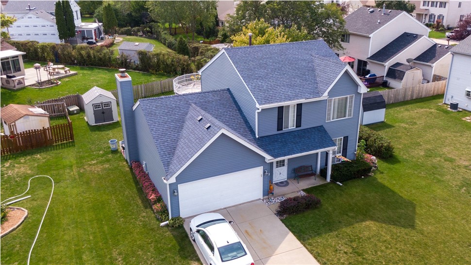 Gutters, Roofing, Siding Project in Streamwood, IL by Horizon Restoration