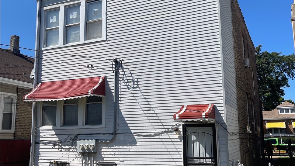 Awnings, Roofing, Siding Project in Chicago, IL by Horizon Restoration
