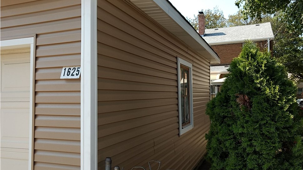 Gutters, Roofing, Siding Project in Elmwood Park, IL by Horizon Restoration