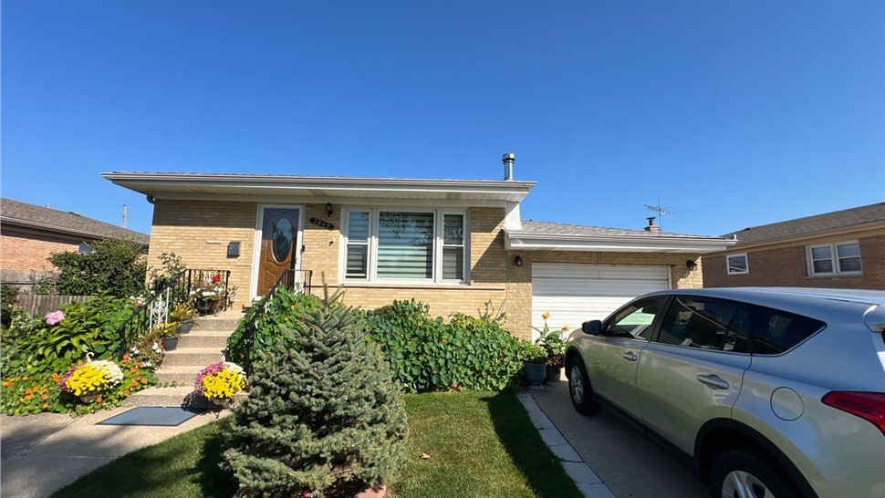 Gutters, Roofing, Roofing Replacement Project in Schiller Park, IL by Horizon Restoration