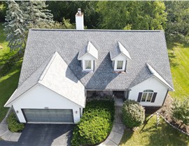 Gutters, Roofing, Roofing Replacement Project in North Aurora, IL by Horizon Restoration