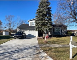 James Hardie Siding: Grey Slate Color with CertainTeed Roofing: Moire Black