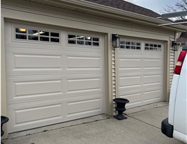 Brand new roof, siding, gutters, and garage door.