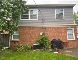 Gutters, Roofing, Roofing Replacement, Siding Project in Niles, IL by Horizon Restoration