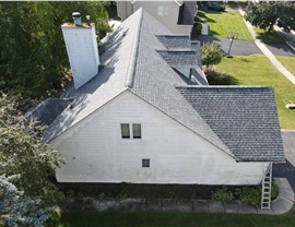 Gutters, Roofing, Roofing Replacement Project in North Aurora, IL by Horizon Restoration