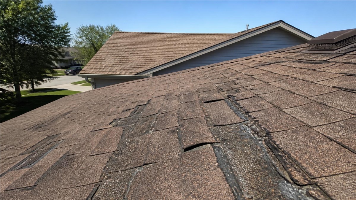 Summer Roof Problems in Gilberts, IL: Heat, Storms, and Shingle Wear