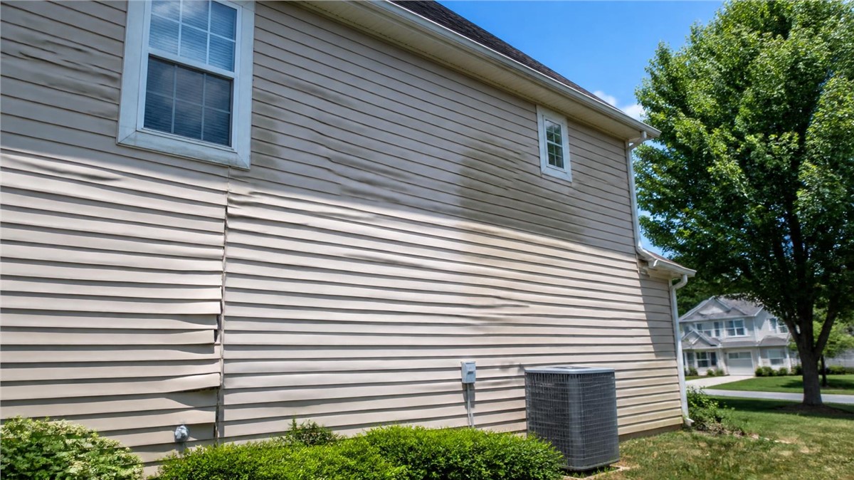 Summer Siding Problems in Huntley, IL: Heat, Fading, and Storm Damage