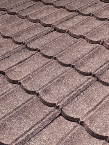 Stone-coated steel roof resembling traditional shingles