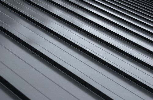 Modern home with standing seam metal roof