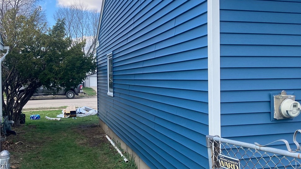 Gutters, Siding Project in Loves Park, Illinois by Huskie Exteriors