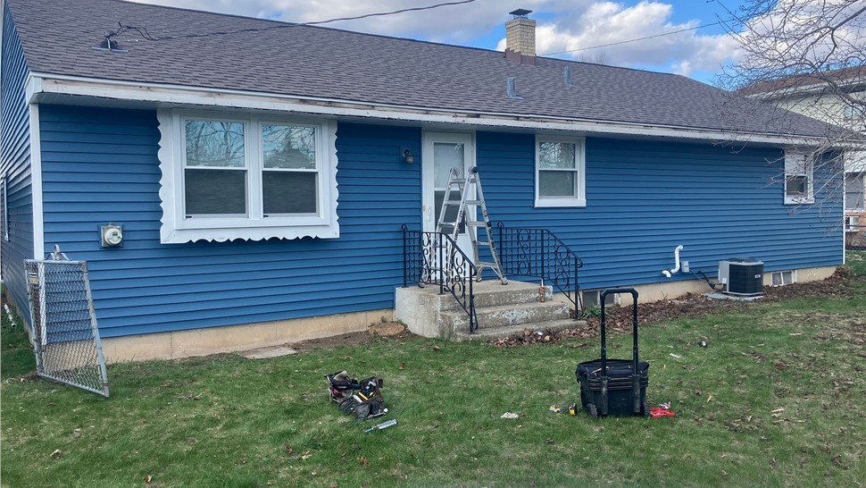 Gutters, Siding Project in Loves Park, Illinois by Huskie Exteriors