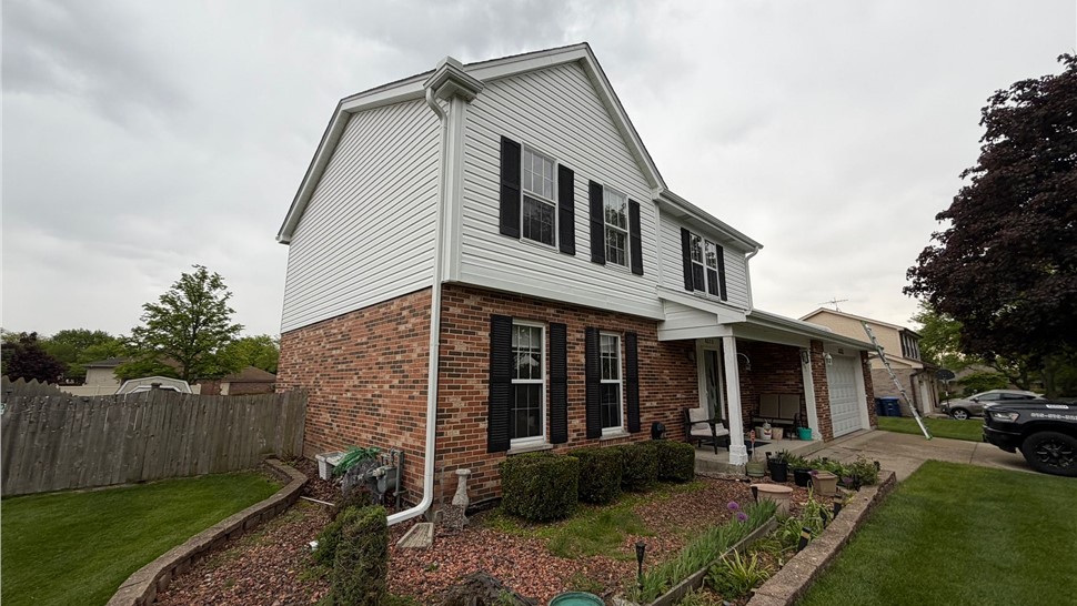 Gutters, Roofing, Siding Project in Darien, Illinois by Huskie Exteriors
