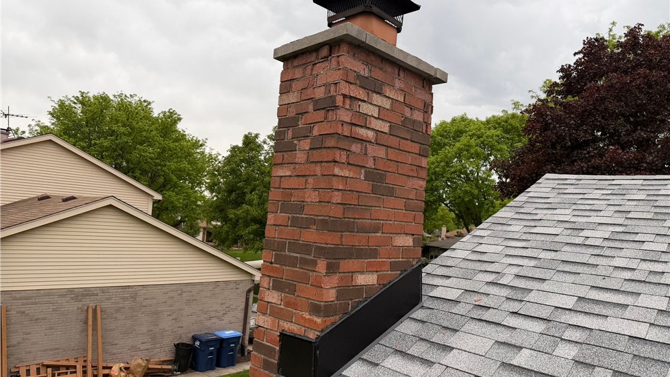 Gutters, Roofing, Siding Project in Darien, Illinois by Huskie Exteriors