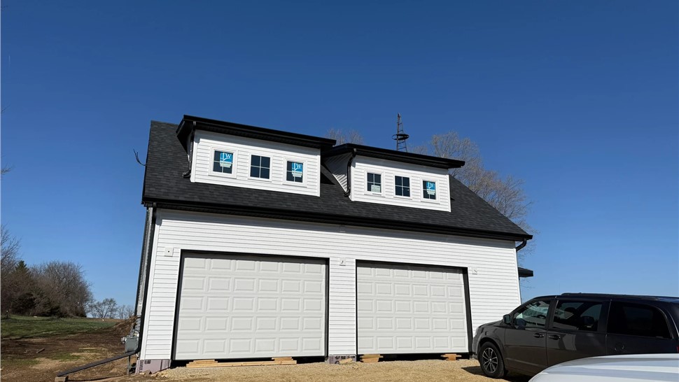 Gutters Project in Byron, IL by Huskie Exteriors
