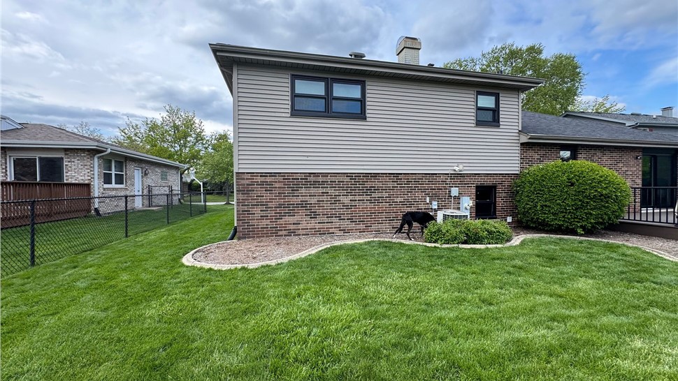 Gutters, Roofing, Windows Project in Woodridge, Illinois by Huskie Exteriors